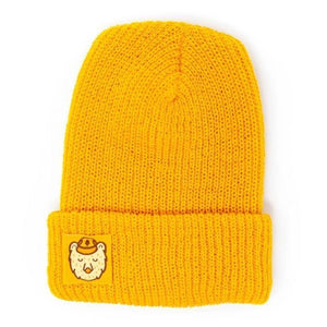 A black Beanie with a yellow square ranger bear patch.