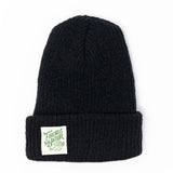 A black beanie with a white square patch with a green text: "FRIENDS OF NATURE.".