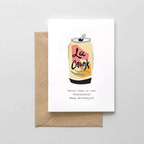 A white card with a black text: "GETTIN LOOSE ON SOME PAMPLEMOUSSE. HAPPY BIRHTDAY!" and an illustration of can drink, La Croix." Comes with a brown envelope.