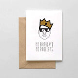 A white card with a black text: "MO BIRTHDAY$ MO PROBLEM$" with an illustration of the rapper, Biggie. Comes with a brown envelope.