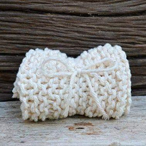 A white knitted washcloth.