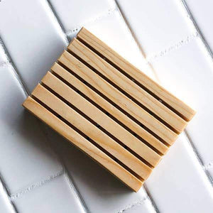 A rectangle wooden soap holder. 