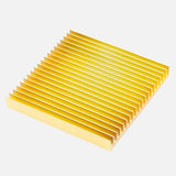 Yellow colored trivet.